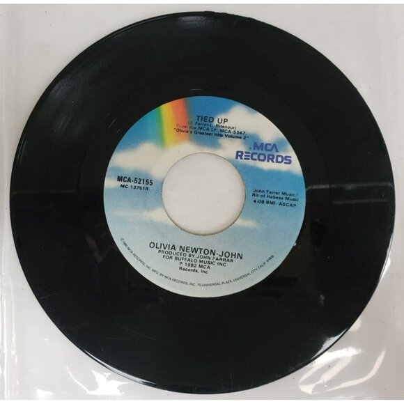 Record 45 RPM Vinyl Olivia Newton John- Silvery Rain/ Tied Up VINTAGE 1982 - Picture 2 of 4